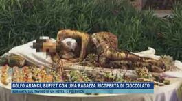 Golfo Aranci, buffet con una ragazza ricoperta di cioccolato thumbnail