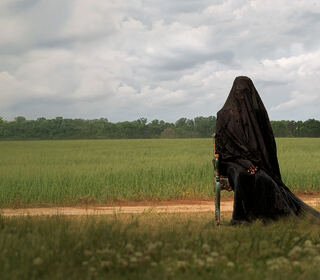 The woman in the yard
